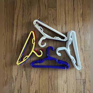 Plastic Hangers for kids clothing, 40 for tops and 14 for pants/shorts/skirts